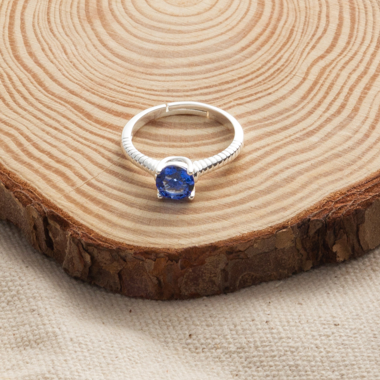 Dark Blue Adjustable Crystal Ring Created with Zircondia® Crystals