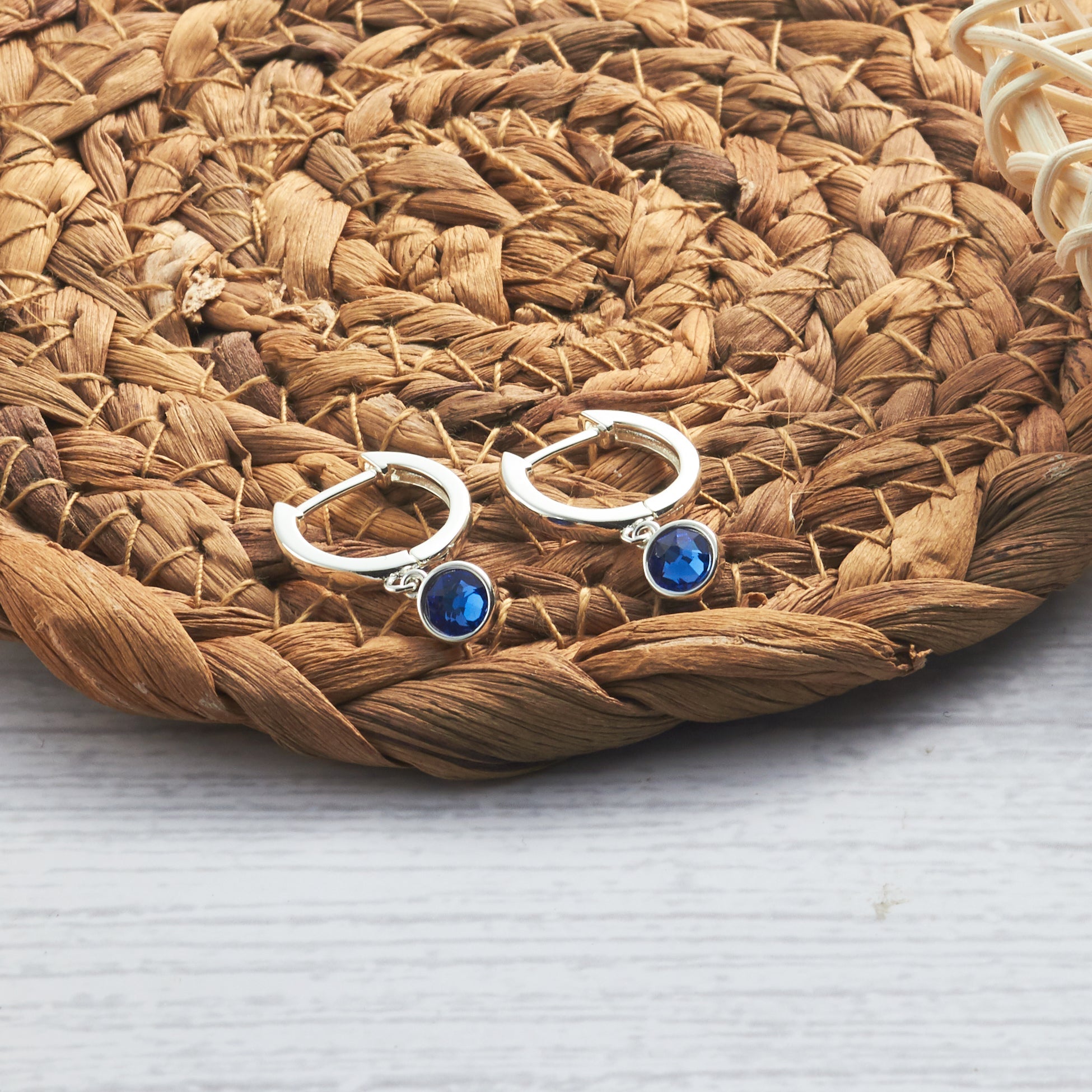 September Birthstone Hoop Earrings Created with Sapphire Zircondia® Crystals - Philip Jones Jewellery