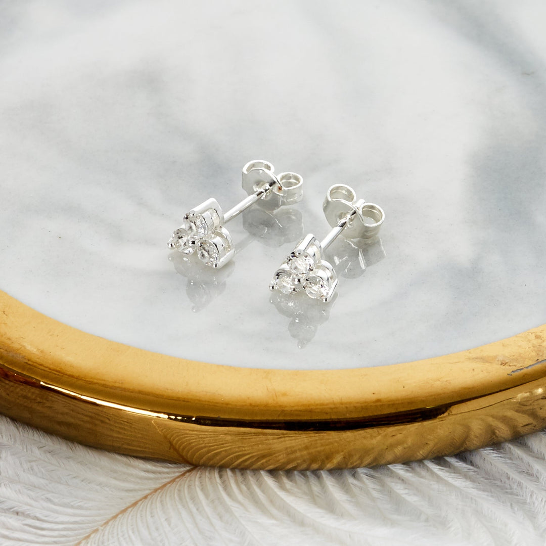 Silver Plated Three Stone Earrings Created with Zircondia® Crystals - Philip Jones Jewellery