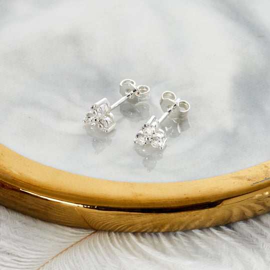 Silver Plated Three Stone Earrings Created with Zircondia® Crystals - Philip Jones Jewellery