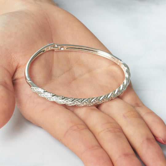 Silver Plated Twist Bangle Created with Zircondia® Crystals (7 Inch) - Philip Jones Jewellery