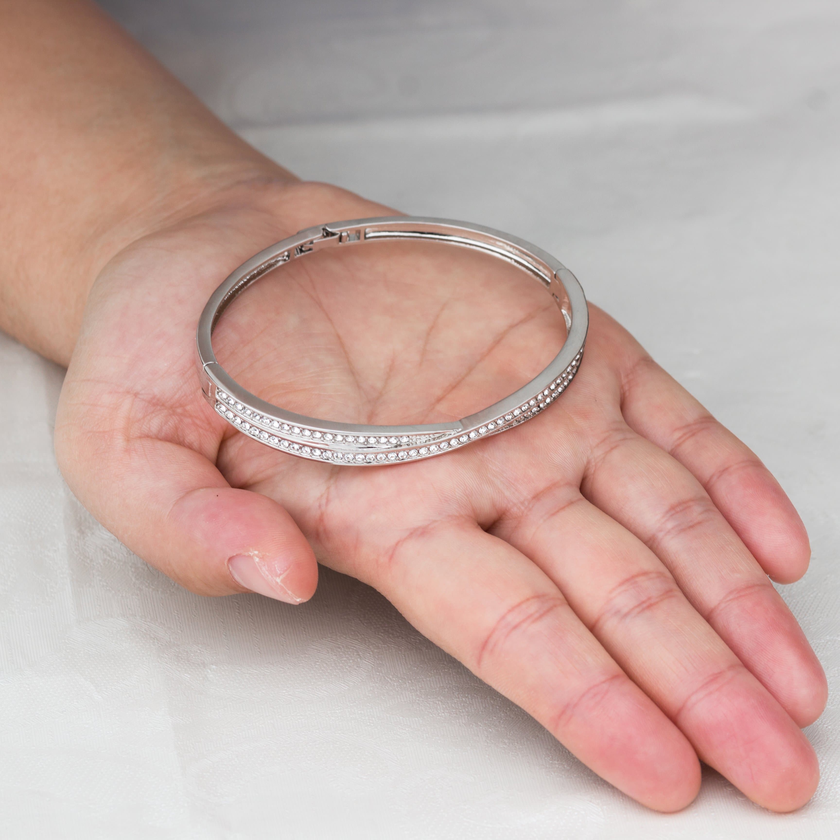 Silver Plated Crossover Bangle Created with Zircondia® Crystals