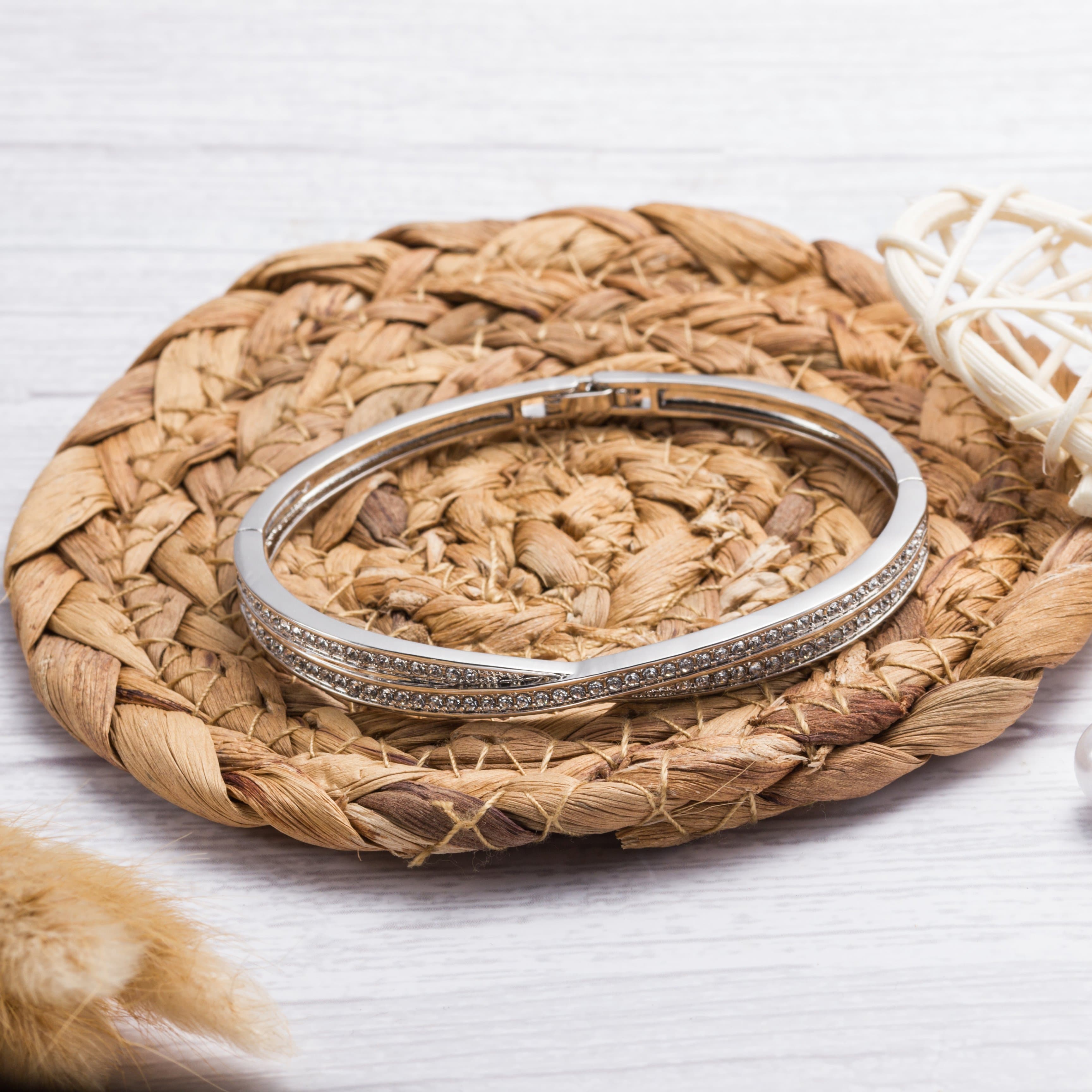 Silver Plated Crossover Bangle Created with Zircondia® Crystals