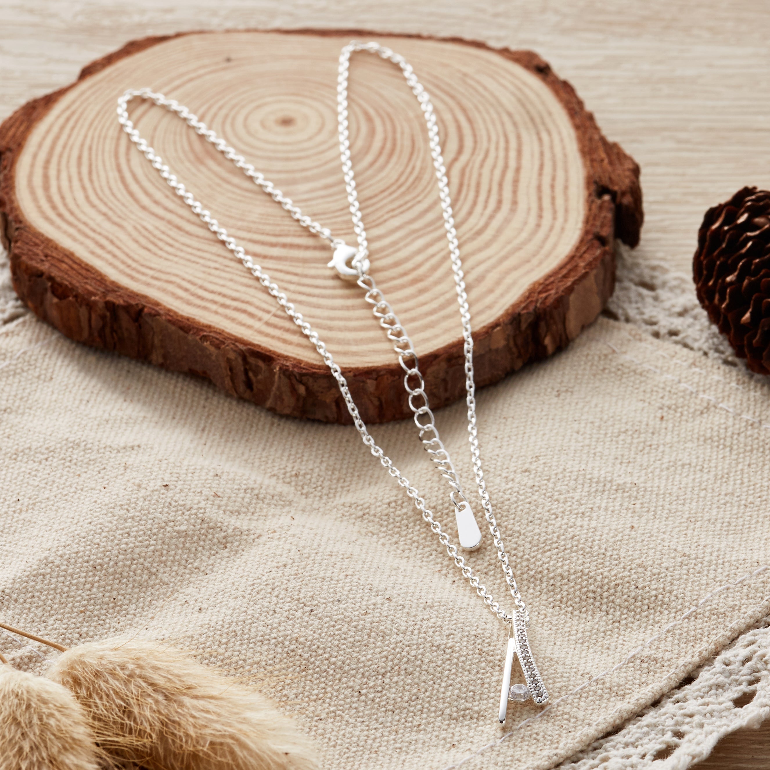 Silver Plated Curved Bar Necklace Created with Zircondia® Crystals