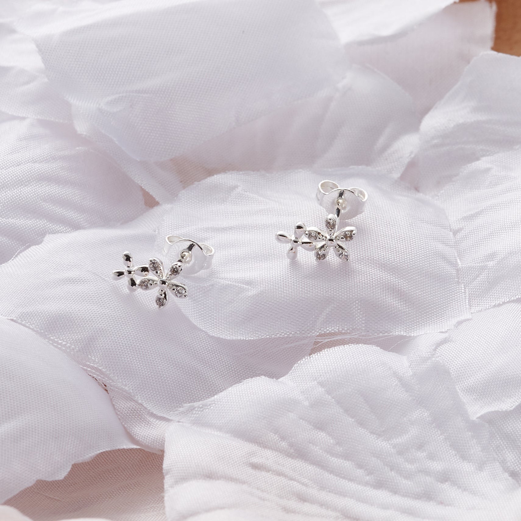 Silver Plated Flower Earrings Created with Zircondia® Crystals