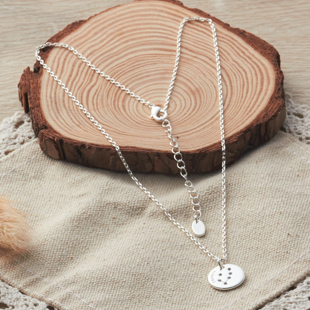 Taurus Zodiac Star Sign Disc Necklace Created with Zircondia® Crystals - Philip Jones Jewellery