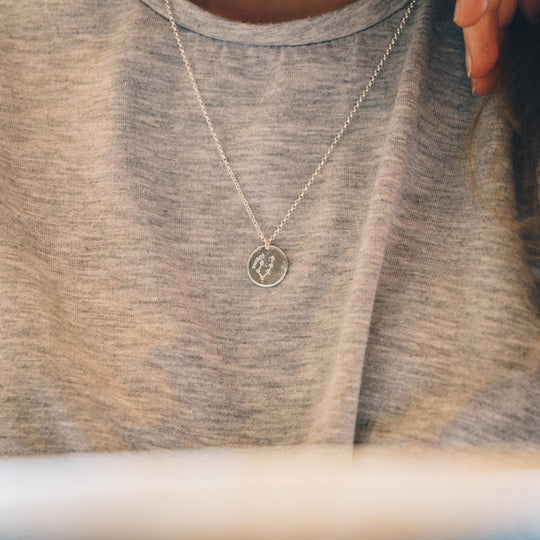 Taurus Zodiac Star Sign Disc Necklace Created with Zircondia® Crystals - Philip Jones Jewellery