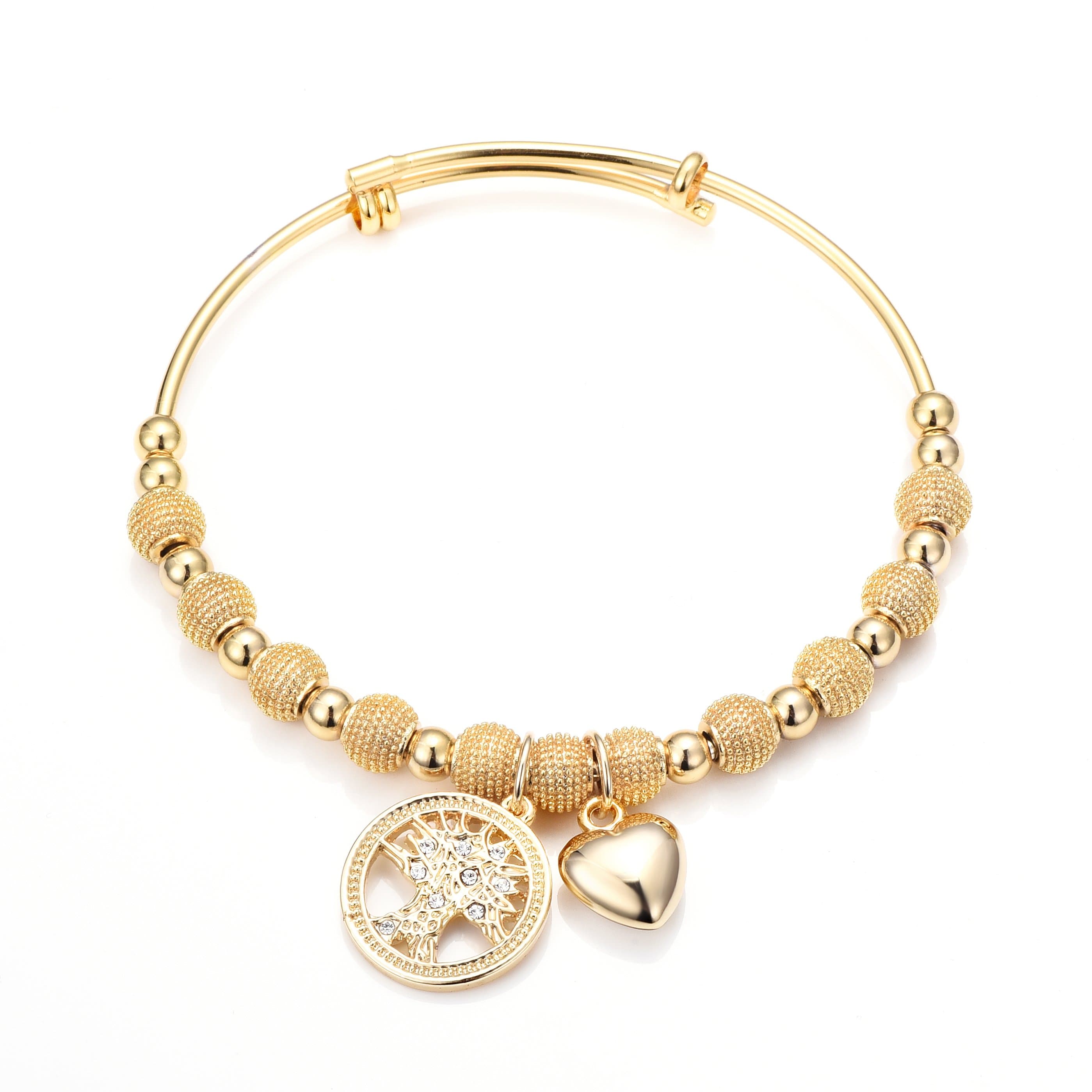 Gold Plated Tree of Life Bangle Created with Zircondia® Crystals by Philip Jones Jewellery